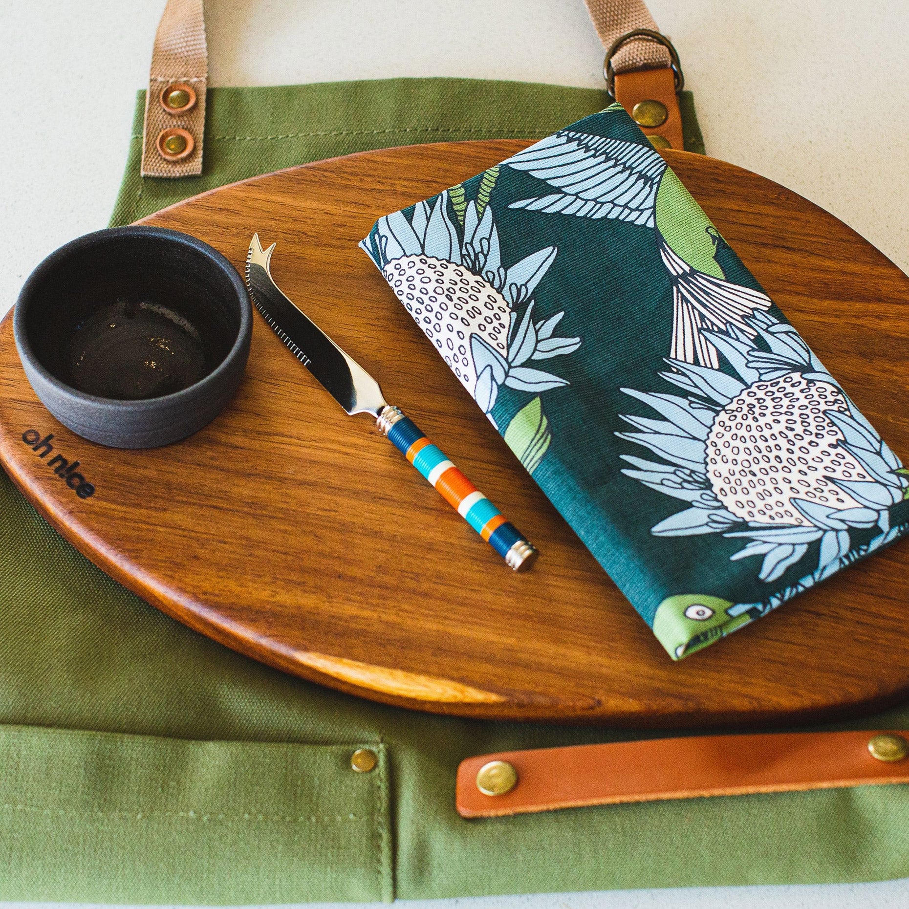 Enhle INDLU Box (Pieter de Jager Canvas & Leather Apron, OH Nice Tapas Board, PaulaG Sea Boat Blue Cheese Knife, A Love Supreme Tea Towel)