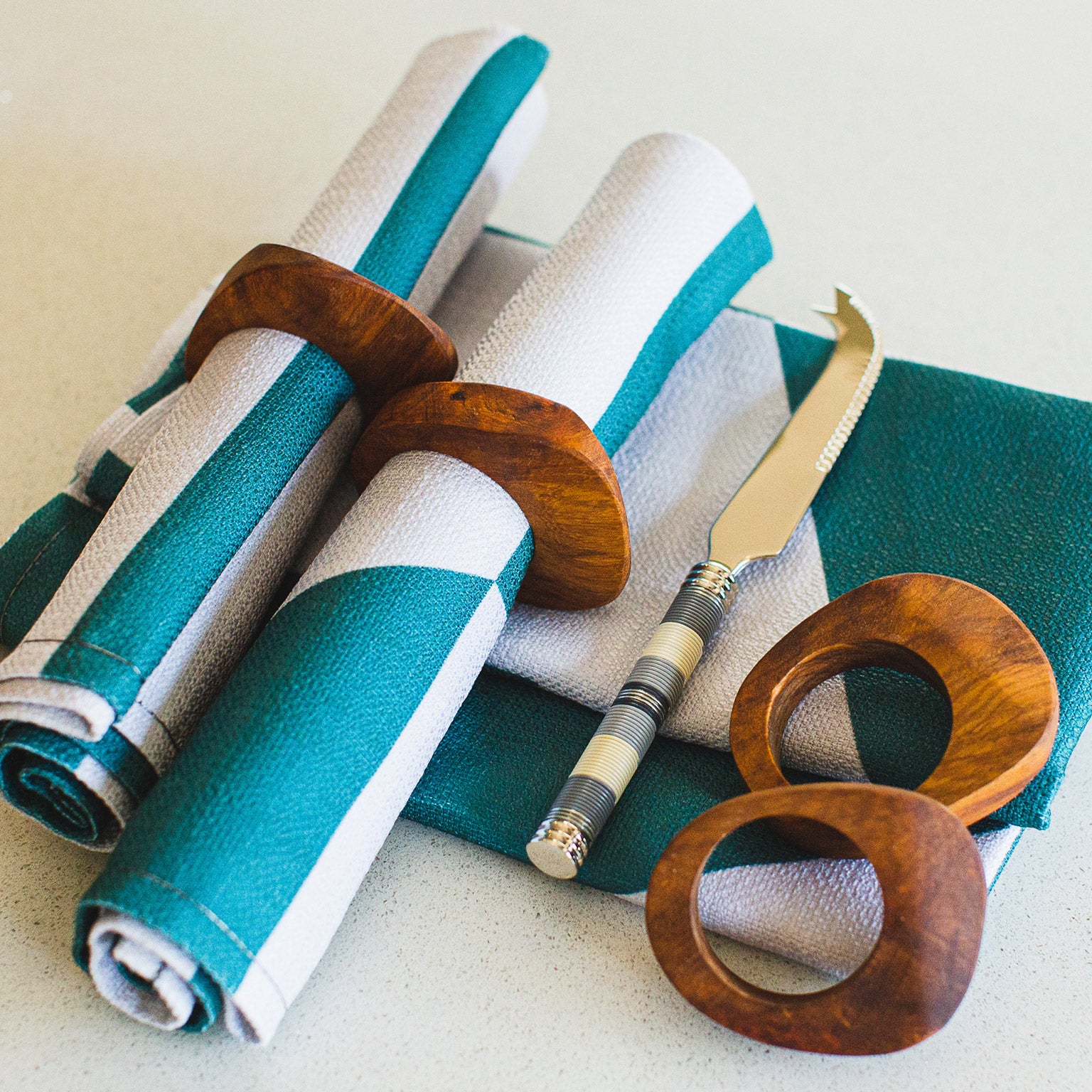 Themba Experience Box (Close up of Napkin Rings, Napkins and Cheese Knife)