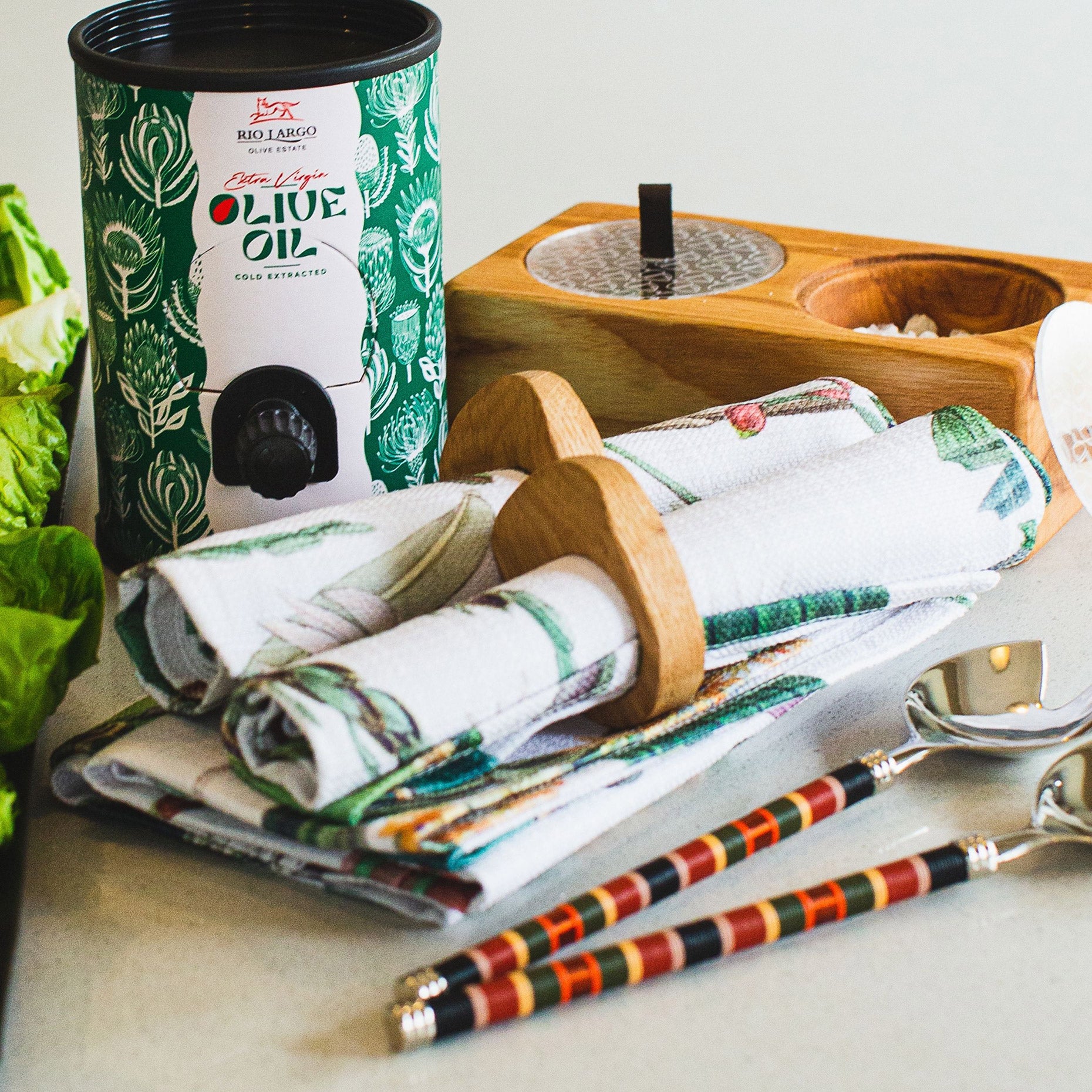 Hayani Home Box (Cara Saven Staying Young Napkins, Oh Nice Oak Napkin Rings, Pieter de Jager Pinch Pots, PaulaG Salad Set Copper Black, A Love Supreme Oive Oil Side Angle)