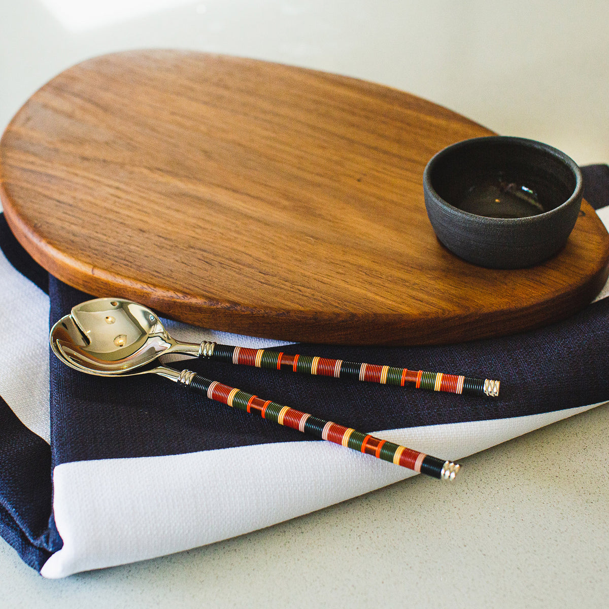 Thabileng Table Collection Box (Close Up of Tablecloth, Tapas Board & Salad Servers)