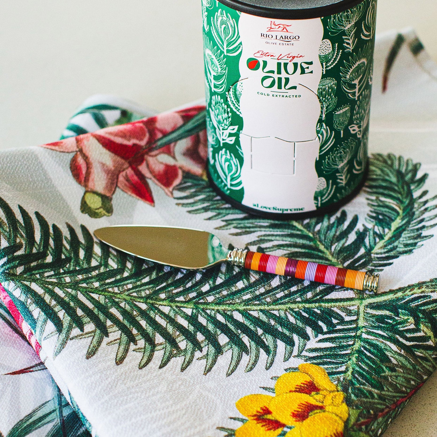 Jambula Treasure Box (A Love Supreme Olive Oil, PaulaG Funky Flamingo Cake Lifter, Cara Saven Napier Tablecloth Close Up)