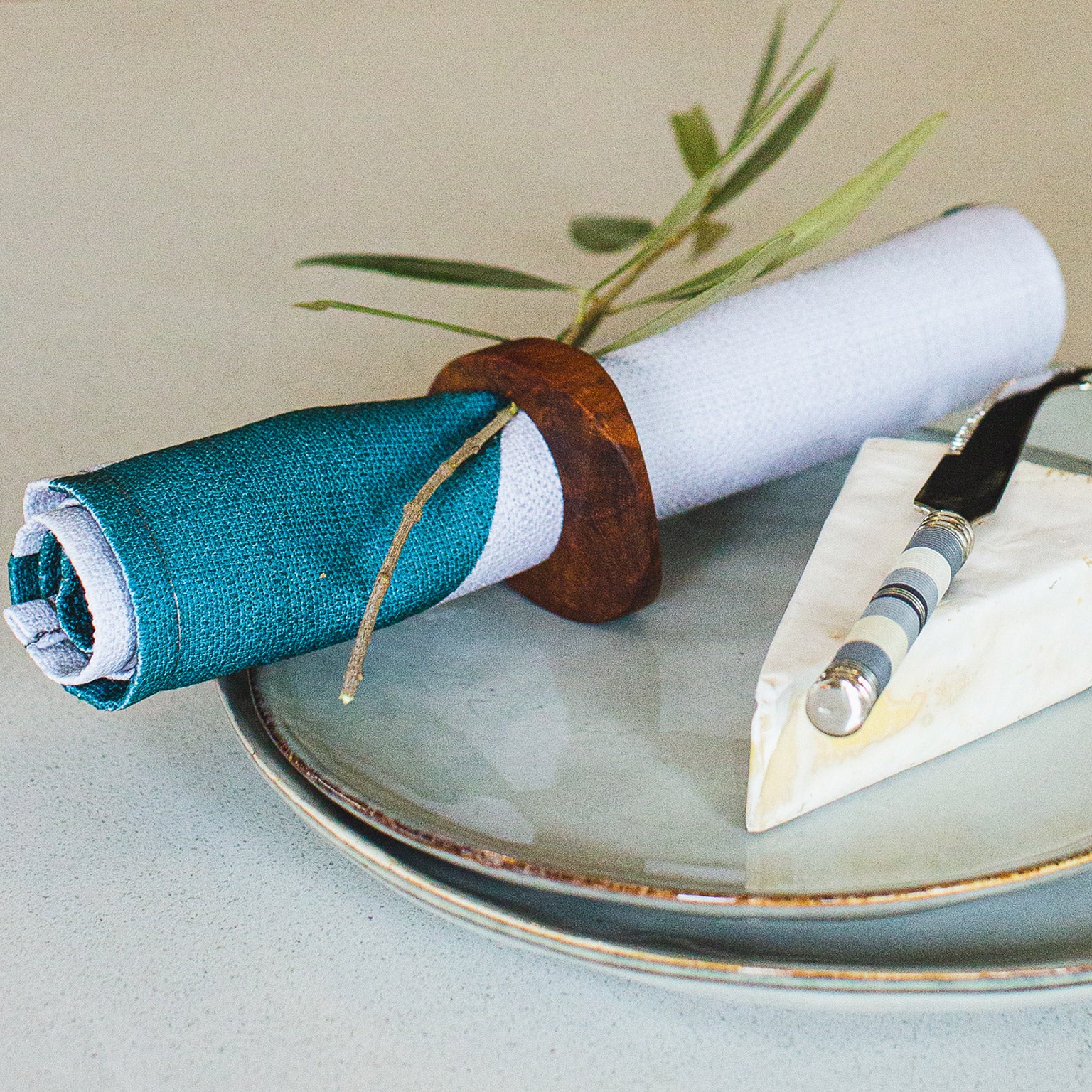 Themba Experience Box (Close up of Napkin Ring, Napkin & Cheese Knife)