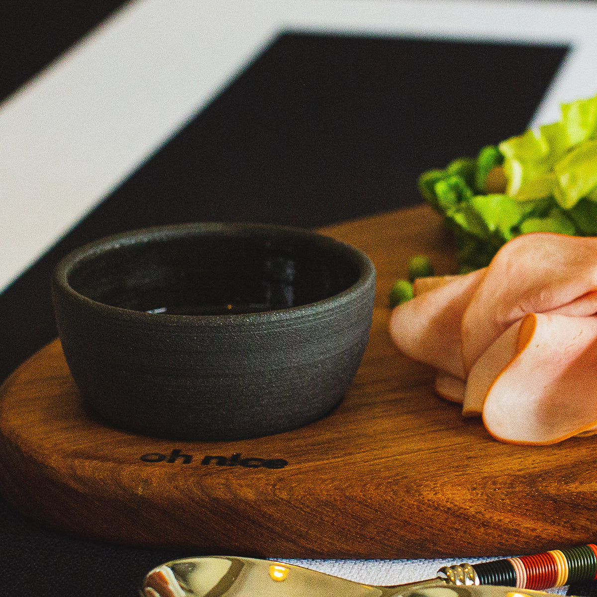 Thabileng Table Collection Box (Close Up of Tapas Board & Talamh Raw Black Clay Bowl)